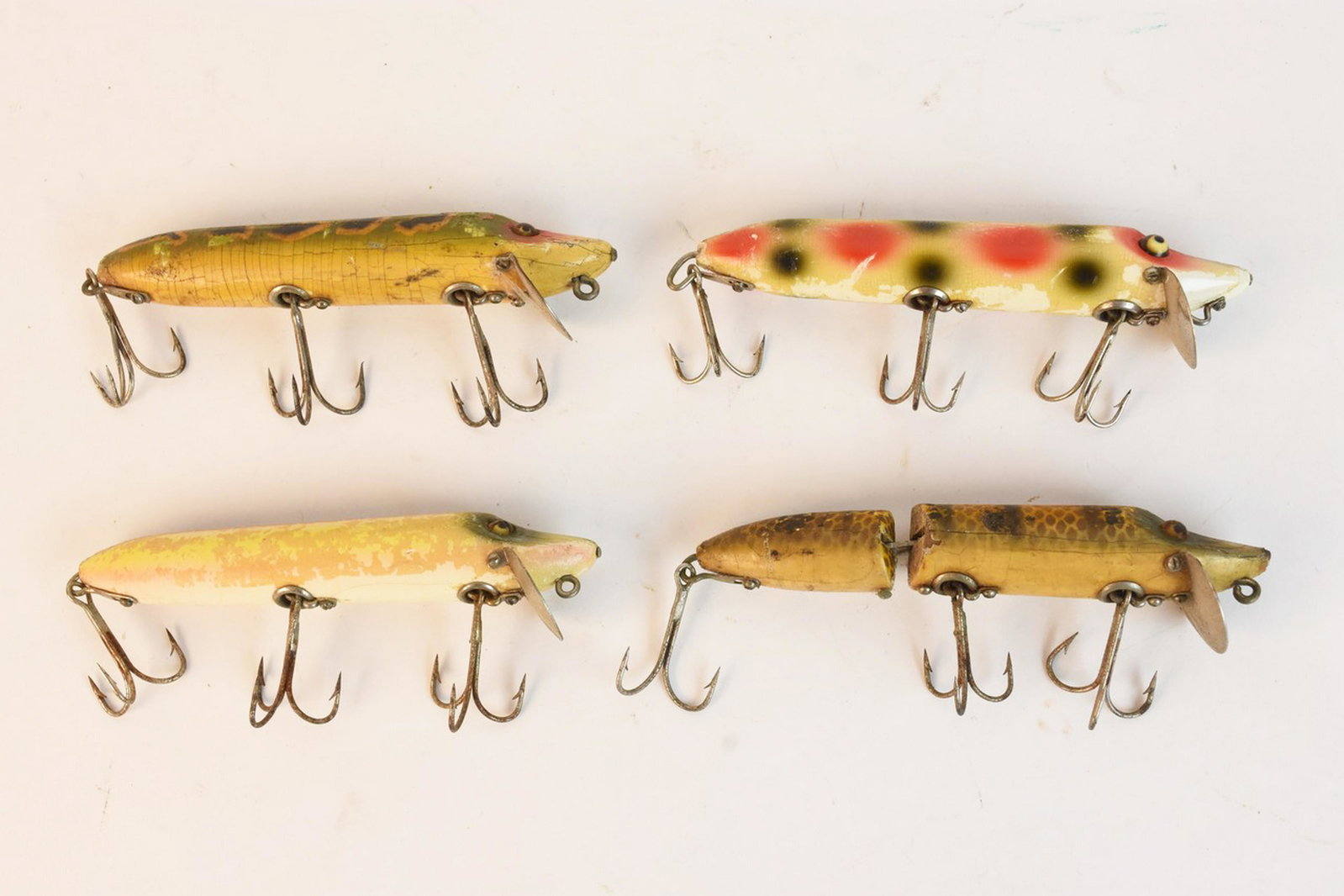 (4) Heddon SOS Fishing Lures: Four Heddon SOS fishing lures. Contact our recommended 3rd party "for profit" shipper Pak Mail at (260) 637-4809 or contact@pakmailshipsfortwayne.com for shipping quote PRIOR to bidding. Scheerer WILL