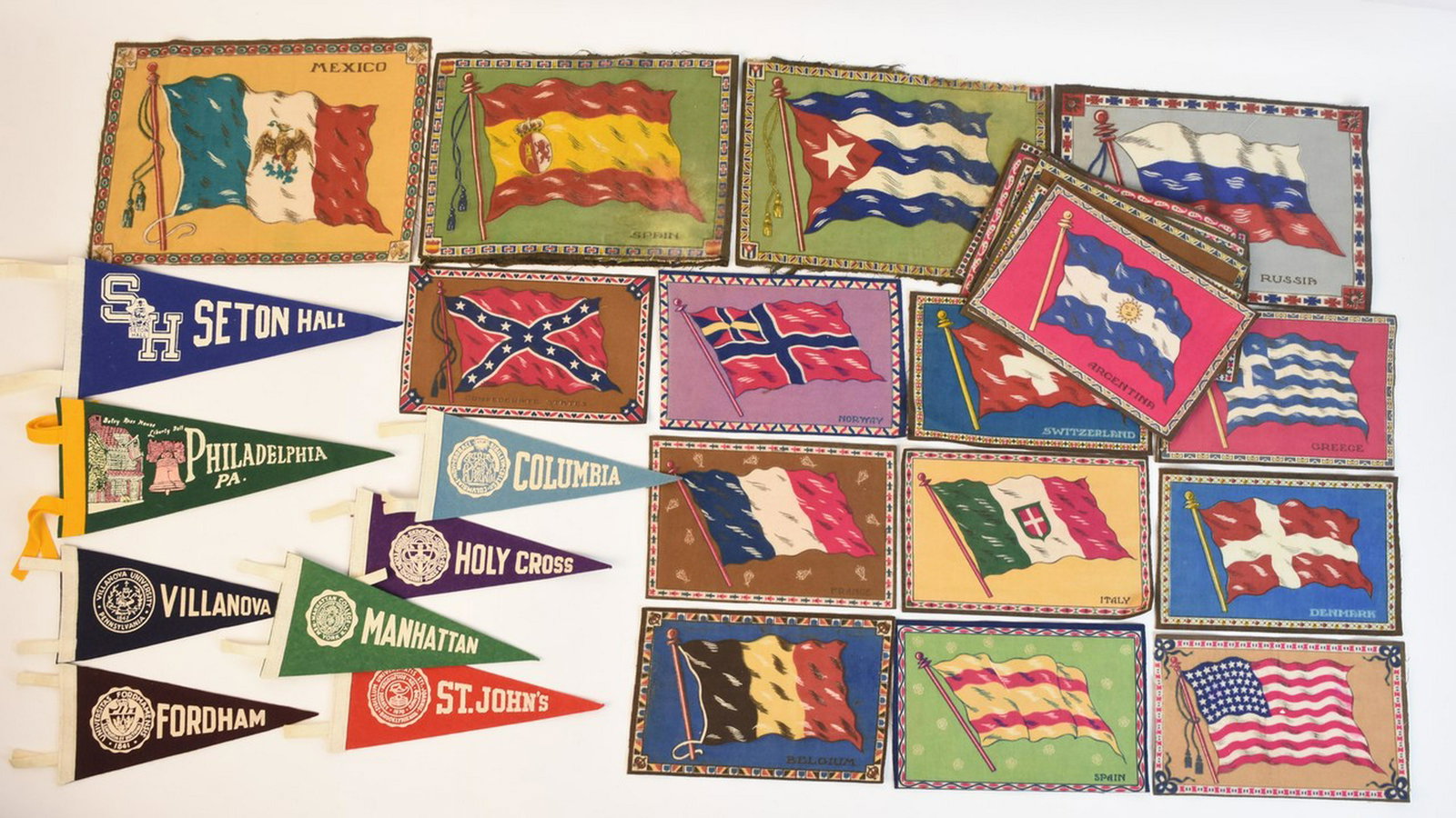 Pennants & Tobacco Felt Flags: An assortment of felt pennants and Tobacco felt flags. The flags include Russia, Confederate States, England, France, Belgium and others. The five large flags measure approx. 7" x 11" and the smaller 