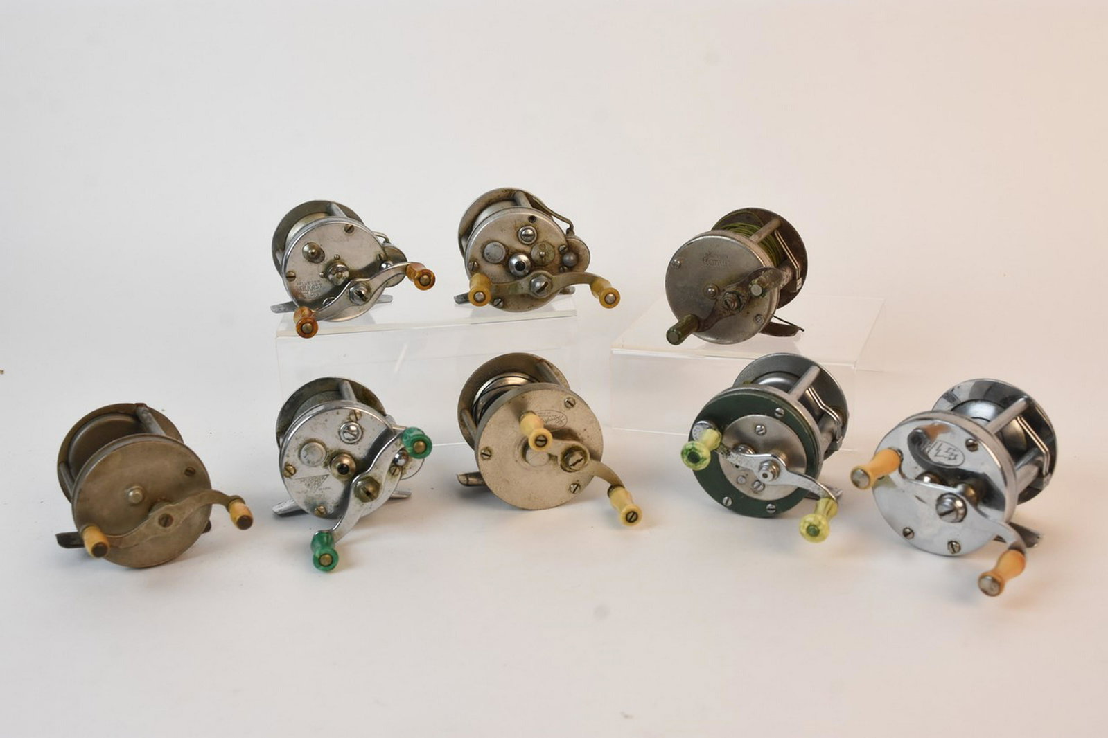 (8) Misc. Casting Reel Assortment: Misc. casting fishing reel assortment. Shakesphere Marhoff 1964 nickel silver model GE. Bronson Comet No. 2433. Lion LW No. 1800. Pflueger No. 1963. Pflueger Skilkast No. 1953. Contact our recommended