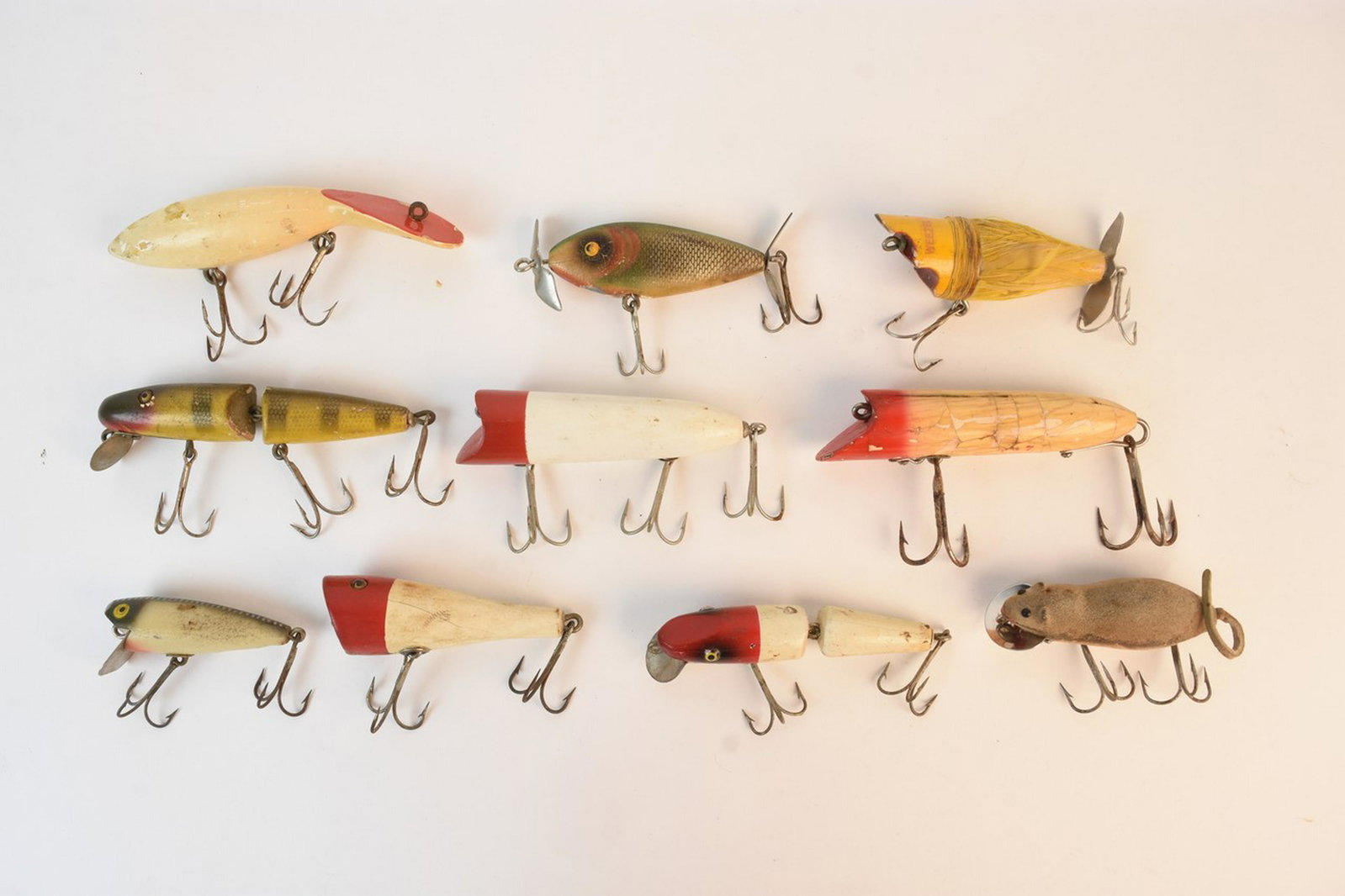 Lure Assortment (Heddon Mouse, Paw-Paw Baits): Fishing lure assortment. Heddon Mouse and Paw-Paw baits. Heddon Meadow mouse and Weezel Sparrow. Contact our recommended 3rd party "for profit" shipper Pak Mail at (260) 637-4809 or contact@pakmailshi
