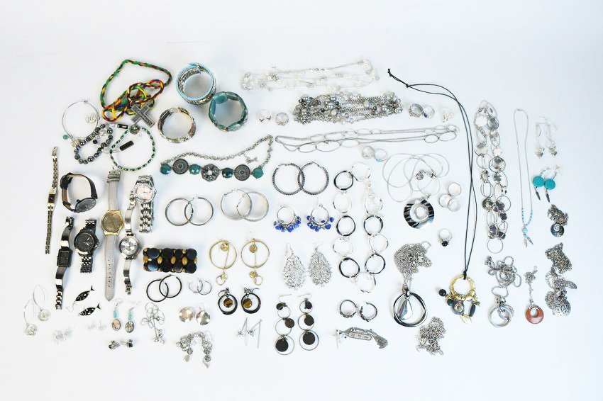 Costume Jewelry & Watches Incl. Sterling 0.40 ozt: A large assortment of costume jewelry with ladies' watches. 0.40 ozt of weighable sterling silver including a ring & pair of earrings. Brand name watches include Seiko, Nine West, Guess, Anne Kline, a