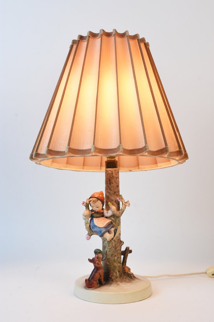 Vintage Hummel Figural Lamp "Culprits Out of Danger": Adorable vintage Hummel figural lamp of girl in tree and dog with one of her slippers in his mouth, "Culprits Out of Danger". Marked on underside W. Germany with a 1936 impression. Lamp stands 18" H. 