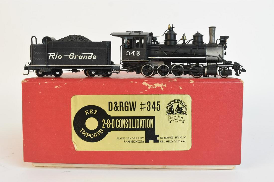 Key Imports D&RGW 2-8-0 #345, C-19: Key Imports D&RGW 2-8-0 Consolidation #345 C-19, made in Korea by Samhongsa. Comes in box. Box measures 7" x 8 1/2" x 3". Overall good UNTESTED condition.