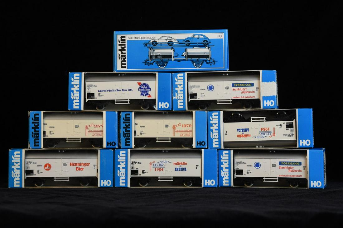 Märklin HO Freight Cars: A selection of nine Märklin HO scale freight railroad train cars in original packaging. Includes #4415, #4569, #4613, and more. Light shelf wear to packaging; some retail sticker residue. One measure
