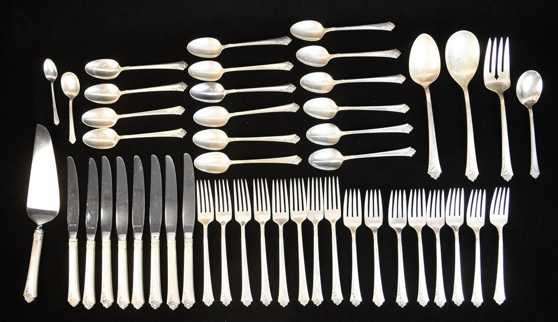 Heirloom Sterling Silver "Damask Rose" 44.60 ozt: A selection of forty-seven pieces of Heirloom Sterling Silver in the "Damask Rose" pattern. Approx. 44.60 ozt of weighable sterling silver. Includes (8) 7.25" forks; (8) 6.5" individual salad forks; (