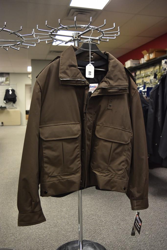 Elbeco Summit Jacket, LRG-R: An Elbeco Summit Jacket, Large-Reg, NWT. Contact our recommended 3rd party "for profit" shipper Pak Mail at (260) 637-4809 or contact@pakmailfw.com for shipping quote PRIOR to bidding. Scheerer McCull