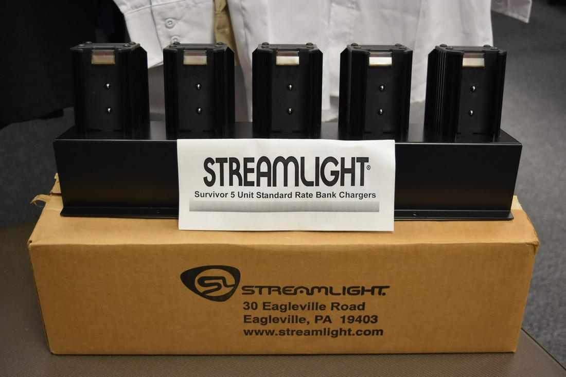 Streamlight Survivor 5 Unit Bank Charger: A 5 unit charging bank by Streamlight for the Survivor series flashlights. New in box. Contact our recommended 3rd party "for profit" shipper Pak Mail at (260) 637-4809 or contact@pakmailfw.com for sh