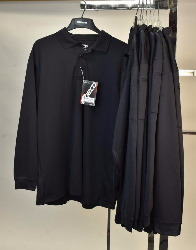 (8) Elbeco UFX Men's Long Sleeve Polos, XL: (8) Elbeco UFX Men's Long Sleeve Tactical Polos, size XL, 100% polyester, all navy. Contact our recommended 3rd party "for profit" shipper Pak Mail at (260) 637-4809 or contact@pakmailfw.com for shipp