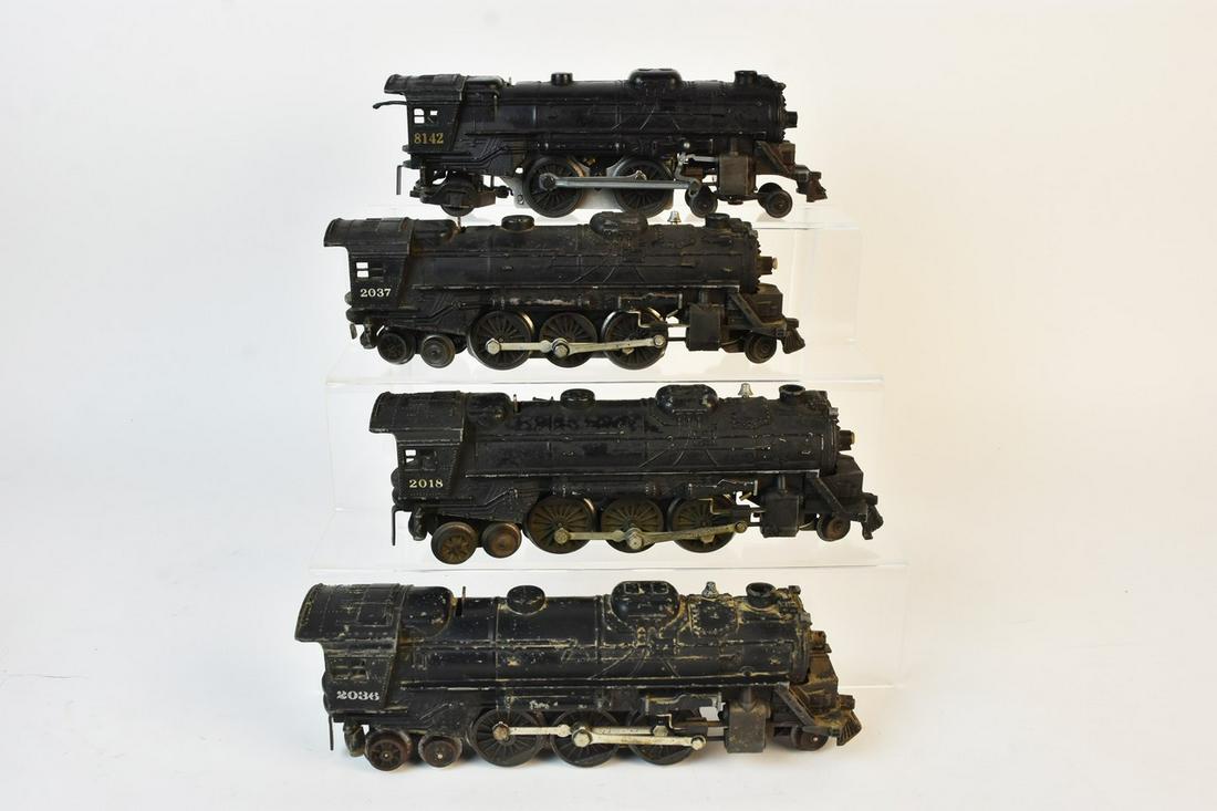 (4) Lionel Steam Engines - 2018, 2037, 8142 & 2036: Lionel steam locomotive #2018, 2-6-4. 10" L, heavy. Lionel steam locomotive #2037, 10" L, 2-6-4, heavy. Steam engine #8142, 4-4-2. Steam engine #2036, 2-6-4. Condition: As is, untested. Wheels move wi