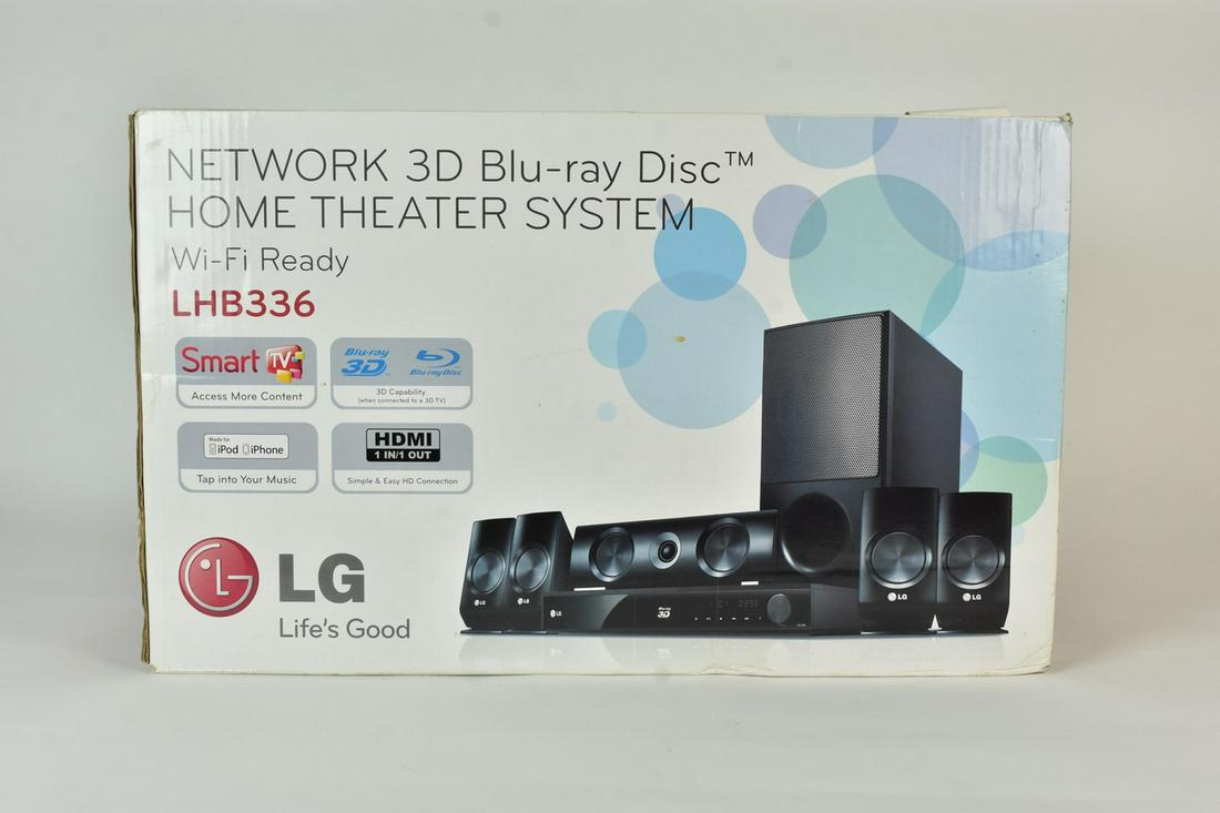 LG 3D Blu-ray Home Theater System: An LG model LHB336 Wi-Fi read Networked 3D Blu-ray Disc Home Theater System in original packaging. Box measures approx. 14.5" H x 23.75" W x 15" D. Please Note: Scheerer McCulloch Auctioneer only ship