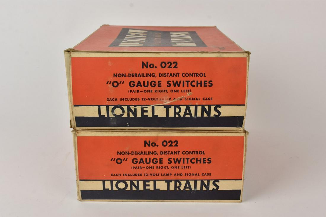 (2) Lionel O Gauge Switches: A pair of model #022 Lionel O Gauge switches in original packaging. Condition consistent with age and use. One box measures approx. 4" H x 5.25"D x 15" W. Please Note: Scheerer McCulloch Auctioneer on