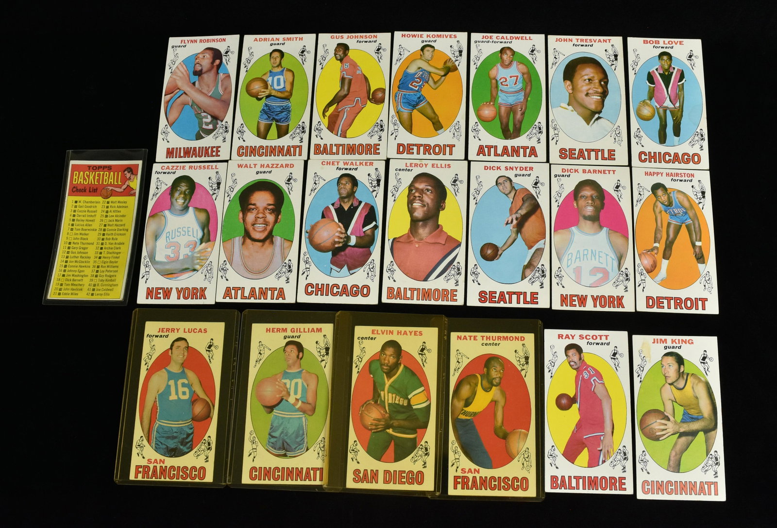 (21) 1970 Topps Basketball Cards: (21) 1970 Topps NCAA basketball cards. Joe Caldwell #41, Bob Love #78, John Tresvant #58, Cazzie Russell #3, Howie Komives #71, Gus Johnson #12, Adrian Smith #97, Flynn Robinson #92, Nate Thurmond #10