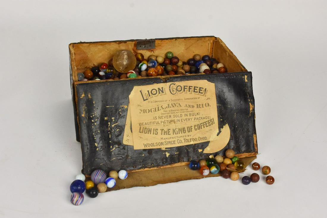 Antique and Vintage Marbles: A large collection of antique and vintage marbles including glass and clay. Condition varies. Box containing marbles measures approx. 5" H x 11.75" W x 6" D. Please Note: Scheerer McCulloch Auctioneer
