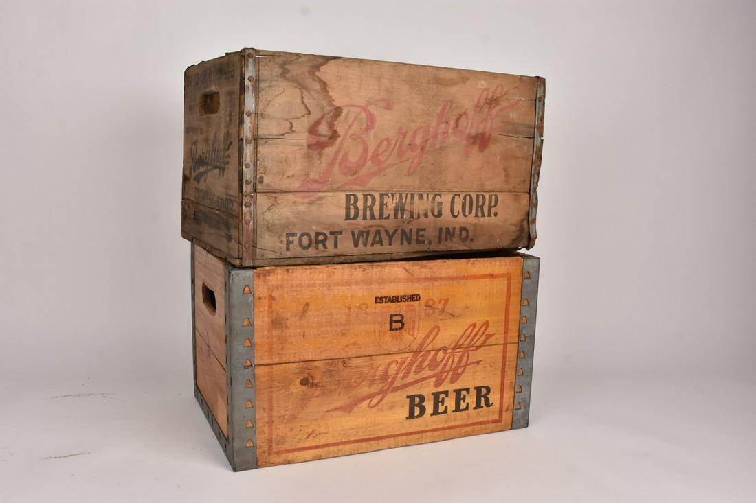Berghoff Beer Wood Crates: A pair of wood crates marked Berghoff Beer one with a yellow finish and metal corners. Measures approx. 10" H x 17.5" W x 12" D. Surface wear; chips and scratches; loss of paint; discoloration. Please