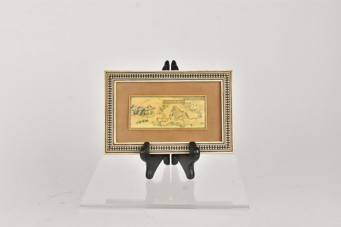 Antique Persian Painting on Bone w/ Inlaid Frame: An antique handpainted Persian piece on bone of a hunt. It is encompassed by a bone inlaid frame. Toning; light surface markings. Measures approx. 6.75" W x 4.25" H. Please Note: Scheerer McCulloch Au