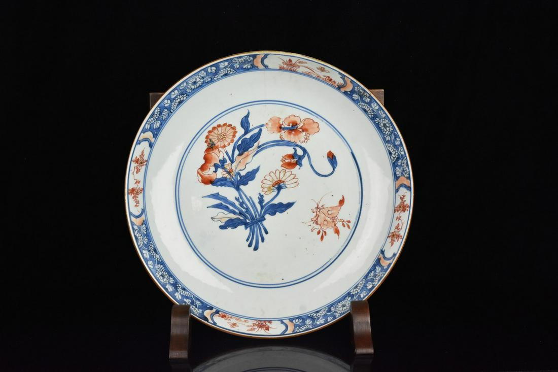 Antique Japanese Imari Porcelain Bowl: An antique Japanese hand-painted Imari porcelain bowl featuring a beautiful flower scene to its center, rim, and side. Measures approx. 12.25" in diameter. Condition consistent with age and use. Pleas