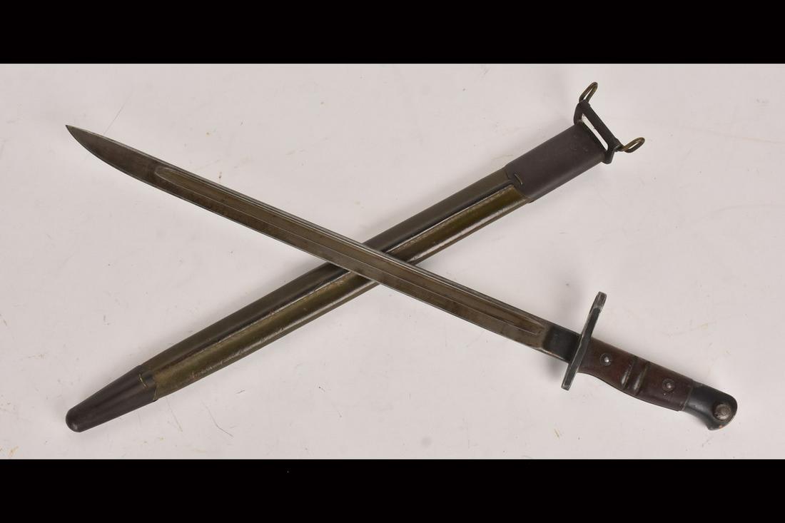 1913 Remington Military Bayonet w/ Scabbard: Size of the bayonet will be added soon. Please Note: Scheerer McCulloch Auctioneer will add shipping charges 1-2 business days after auction. Some items, such as exceptionally fragile items, items won