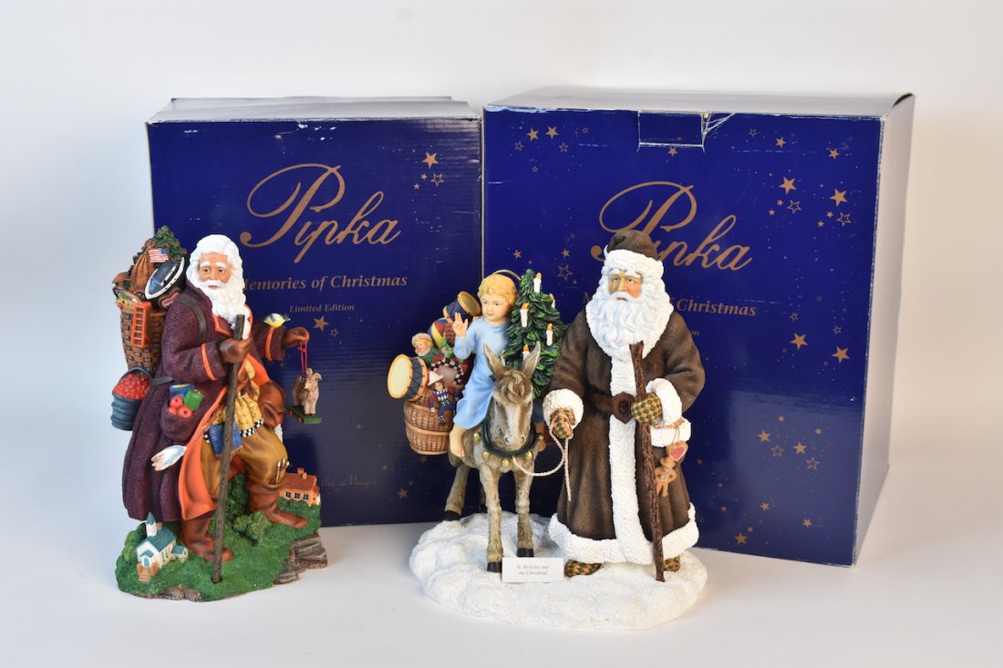 Pipka Limited Edition Santas (2): A pair of Pipka Limited Edition Santas in original packaging from the Memories of Christmas series. Includes Door Country Santa numbered 371/4500 (#13924); and St. Nicholas and the Christkind, numbere