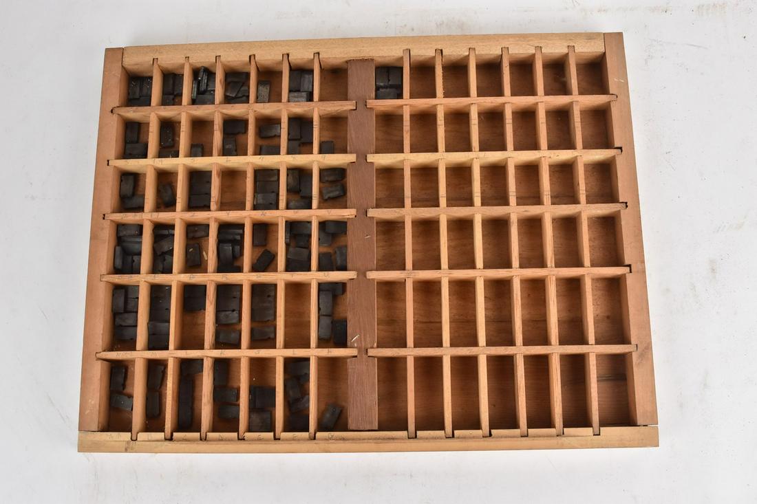 (1) Vintage Wooden Typeset Tray and Letters: (1) Vintage wooden typeset tray 16.5"x 21.75" x 1.25". Wood tray with some wear and minor chipping. Tray includes assorted letters, numbers, and punctuation. Please Note: Scheerer McCulloch Auctioneer