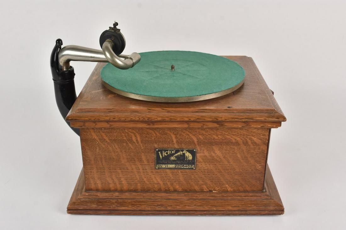 1916 Victor Victrola VV-VI: 18.875" X 15.375 X 13.25" Total dimensions with arm stored. 1916 Victor Victrola Model VV-VI, Serial number 220640F dates the machine. In working order, complete with needle. Excellent condition with