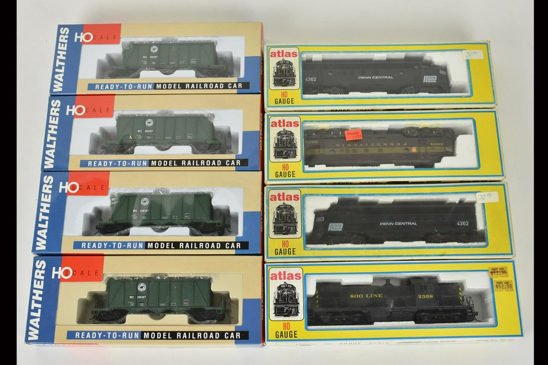 (8) Atlas & Walthers HO Train Cars/Engines: A collection of eight train cars/engines featuring Atlas and Walthers. Includes Ortner Aggregate Cars; Soo Line RS-1 Diesel; and more. Shelf wear to packaging; retail stickers. Please Note: Scheerer M