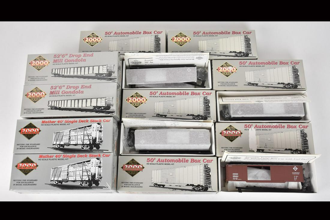 (14) Proto 2000 Series HO Scale Model Train Kits: A collection of 14 HO scale Life-Like Proto 2000 Series model train kits in original packaging. Packaging not checked for completeness; eight boxes still sealed; light shelf wear. Please Note: Scheere