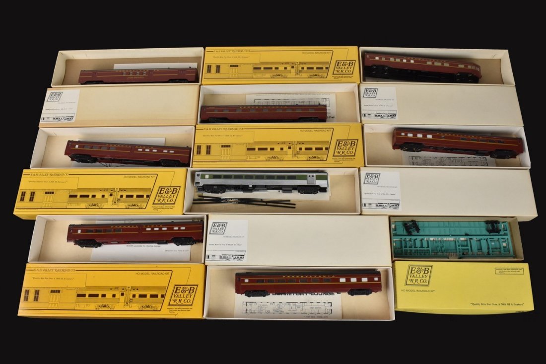 (9) E. & B. Valley Railroad Model Trains: A collection of nine HO scale E. & B. Valley Railroad model trains in original packaging; most kits are assembled/partially assembled. Includes Penn Central Gondola; Pennsylvania Pullman Dining Car; P