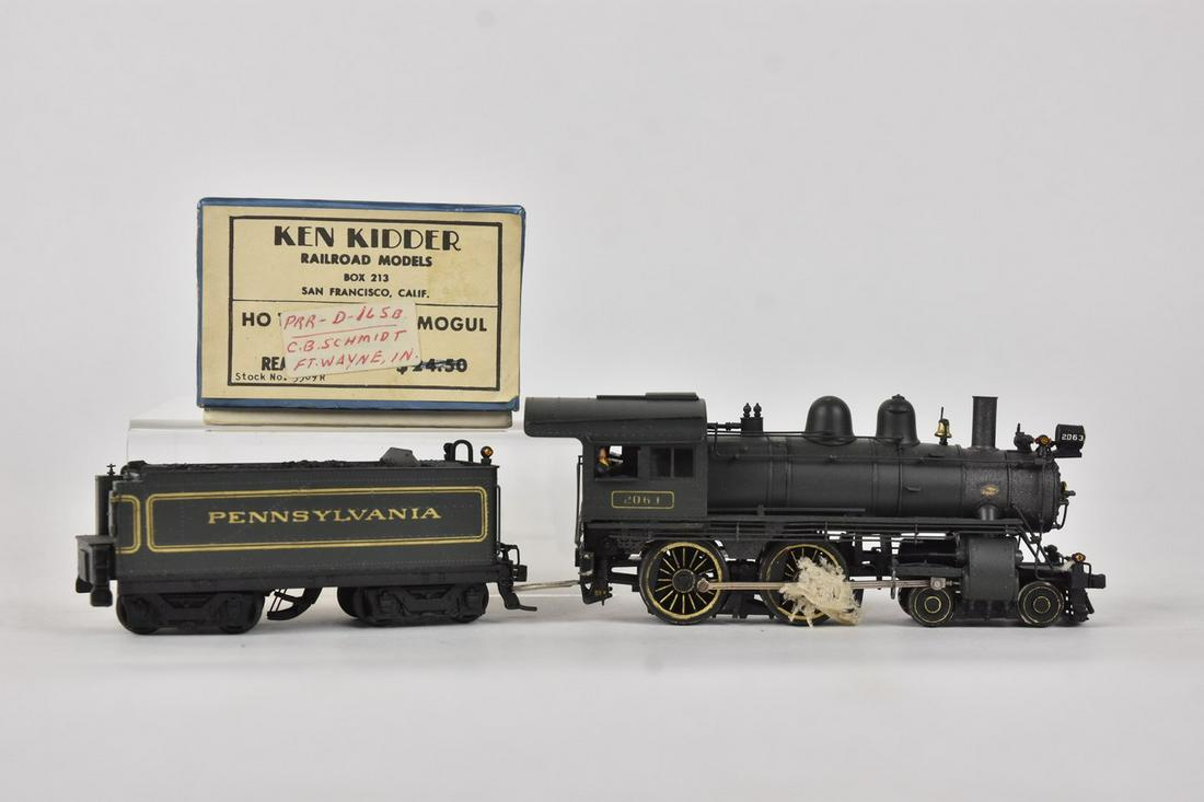 Olympia Models Japan, Gem Models PRR 4-4-0 Engine: An HO scale PRR D-165B 4-4-0 steam locomotive produced by Olympia Precision Models of Japan, distributed by Gem Models, and sold by Ken Kidder Railroad Models. Light wear to packaging. Please Note: Sc