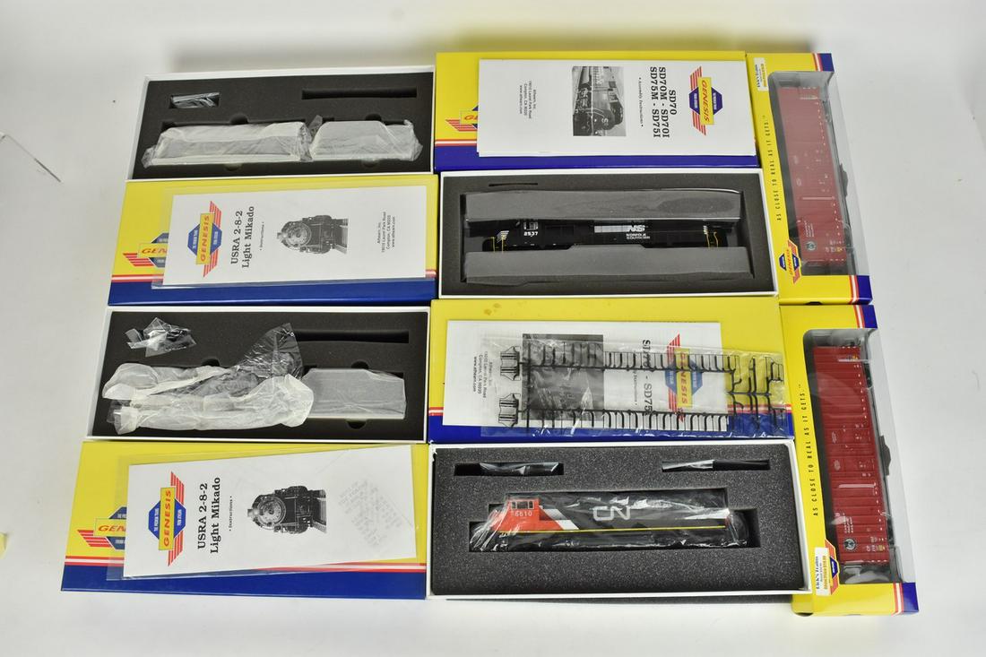 (6) Genesis HO Scale Train Cars: A collection of six Genesis brand HO scale train cars in original packaging. Includes diesel engines, 2-8-2 locomotives, a gondola, and box car. Light shelf wear to packaging; retail stickers present.