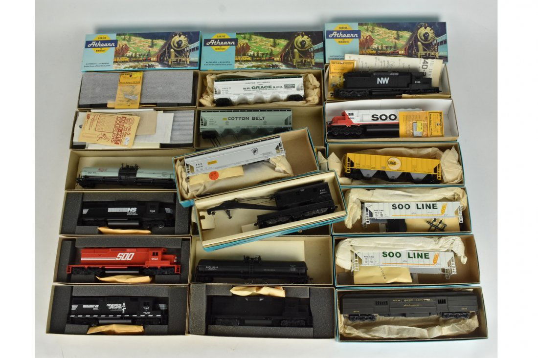 (20) Athearn HO Scale Train Cars: A collection of 20 Athearn HO scale model train kits in original packaging, most assembled. Includes a Soo Line SD40-2 Dummy Diesel; Norfolk & Western SD40-2 Powered Diesel; GP38-2 Pwr; and other trai