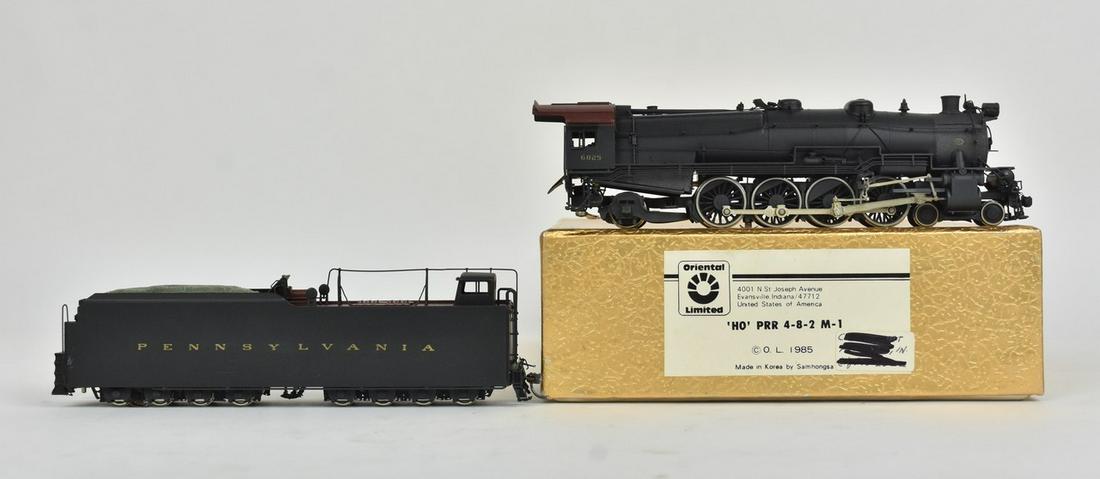 Oriental Limited HO Scale PRR M-1 Loco: An Oriental Limited HO scale brass Pennsylvania Railroad 4-8-2 Class M-1 locomotive made in Korea by Samhongsa. In original packaging, light shelf wear. Please Note: Scheerer McCulloch Auctioneer will