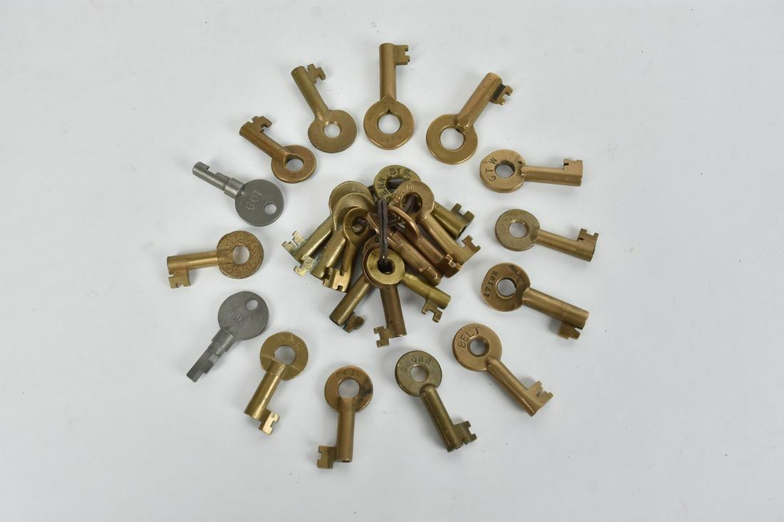 Railroad Lock Keys, Mostly Brass: A collection of railroad lock keys comprised of mostly brass; a few are base metal. Includes Wabash, N & W, C&N, B&O, and more. Condition varies- consistent with age and use. Please Note: Scheerer McC