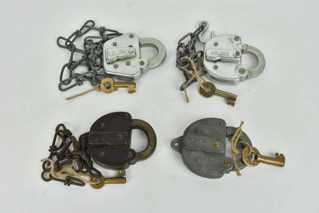 (4) Railroad Locks w/ Keys: A collection of four railroad locks with keys. Includes Slaymaker PRR; Slaymaker Eries; Adlake CSS; and Keline NICTD. Condition varies- consistent with age and use. Please Note: Scheerer McCulloch Auc