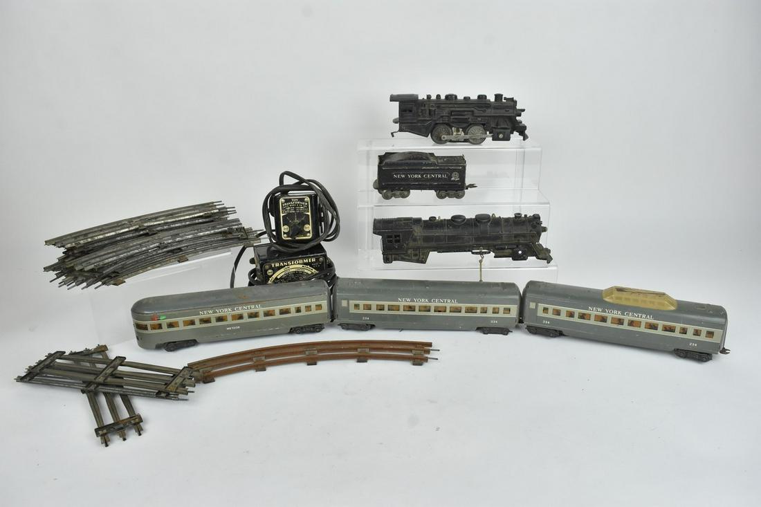 Vtg. Marx Trains & More: A collection of vintage trains including a Marx 0-4-0 switcher; a Marx locomotive shell; a New York Central Station tender; three unmarked New York Central streamlined passenger cars; two transformers