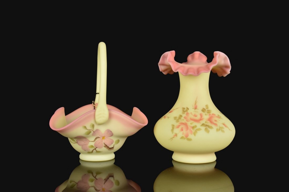 (2) Fenton Burmese: (1) 8" x 5.25" Fenton basket 1980's release Burmese glass, hand painted , square pinch edge, floral design. (1) 7.25" x 5.5" Fenton vase with "triangle pinch" ruffle top, 1980's release, Burmese glass