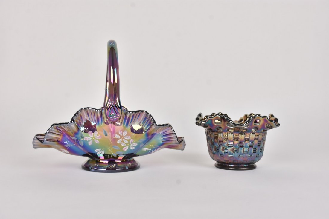(2) Fenton Amethyst Carnival: (1) 8" x 9" Fenton amethyst Carnival glass basket. Hand painted, iridescent purple, ruffle edge, stamped handle. Excellent condition with tags. (1) 3" x 5.25" Fenton amethyst Carnival glass, basket we