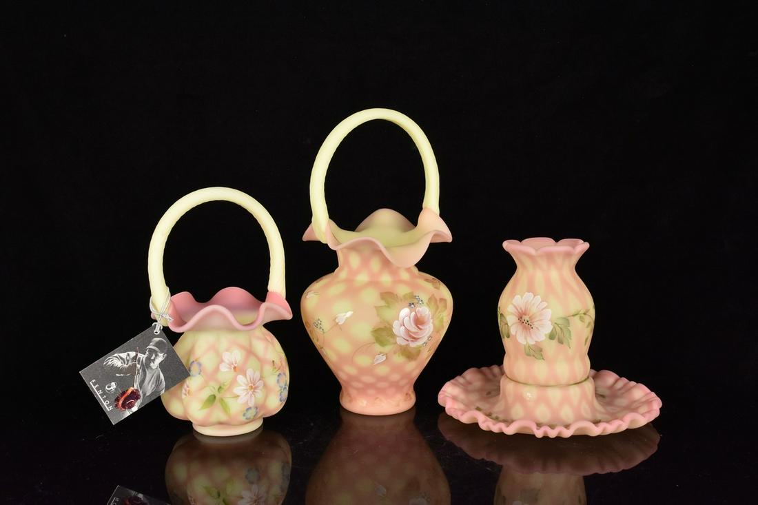 (3) Fenton Burmese Glass: (1) 10" Fenton Burmese glass basket, with "coinspot optics", cream yellow twist handle. Hand painted, floral design. Excellent condition with tags. (1) 5.5" Lamp with diamond optic pattern. Hand paint