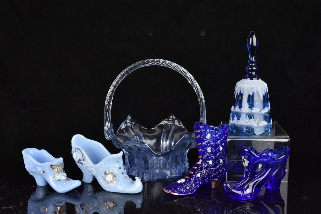 (6) Fenton Blue: (1) 8" Fenton clear blue basket. Twist handle. Excellent condition with tags. (1) 7" Cobalt bell. Limited edition 1387/2500. Hand painted winter snow scene. Excellent condition with tag, signed inside