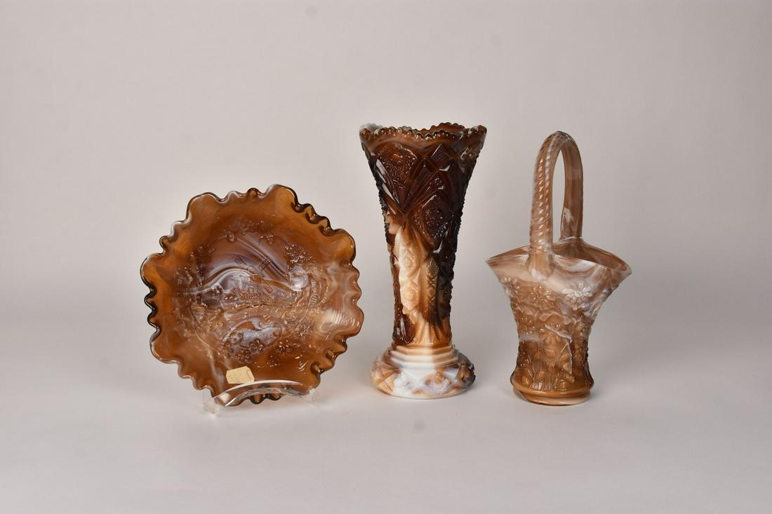 (3) Imperial Caramel Brown Slag: (1) 5" x 9.75" Imperial caramel brown slag glass pressed glass vase. Heavy detail pattern. Excellent condition, stamped base. (1) 10" x 5" x 3.5" Pressed glass basket in daisy pattern. Excellent condi