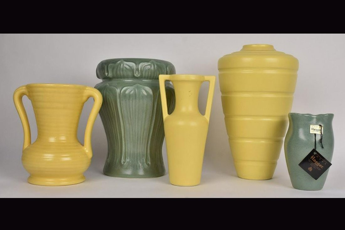 (5) Haeger Pottery: (1) 8" x 14" Royal Haeger by Larry Laslo, yellow vase. Excellent condition with tags, stamped base. (1) 8.5" x 12.5" Green vase. Style 069. Excellent condition with tag, stamped base. (1) 9" x 9.25" Y