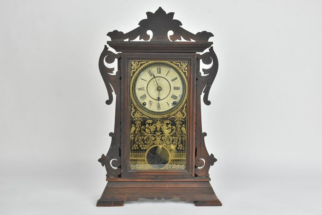 Seth Thomas "Newark" Clock: 13.75" x 5" x 22" Vintage Seth Thomas "Newark" clock in walnut. Shelf clock with original parts, including face stamped with "S.T.", manufactured in 1880-1900. Please Note: Scheerer McCulloch Auctione