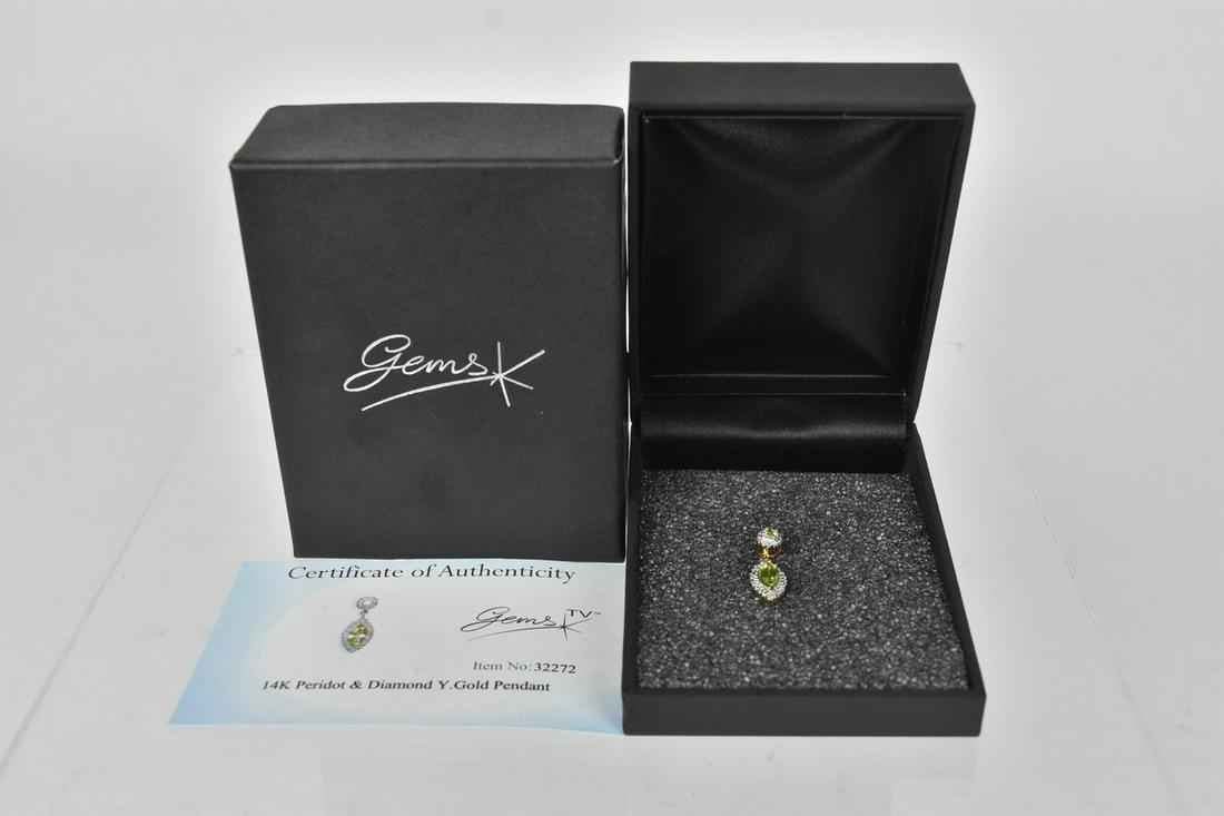 14K Peridot & Diamond Gold Pendant, Certified: A certified 14K Peridot & Diamond Y Gold Pendant. Total approx. metal weight: 1.370g; MTGW: 0.433ct; Marquiese & Round Peridot: 0.385ct & 0.042ct; Round Diamond: 0.6mm, 0.006ct. Includes Certificate o