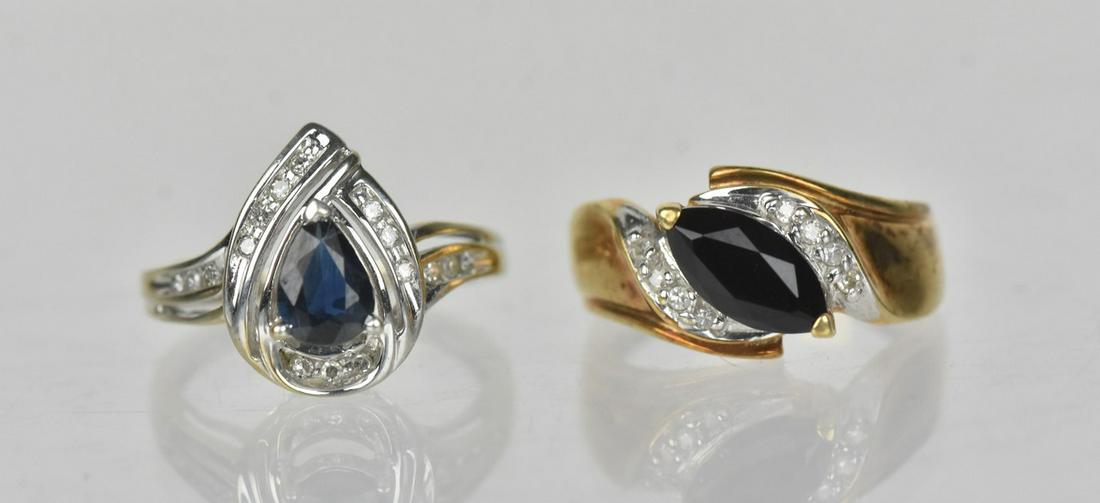 10K Gold Rings w/ Black Stone & Diamond Accents, g: A 10K gold ring weighing approx. 3g total. Both include a large black stone and small diamond accents (less than 1ct each). Black stone is approx. 10mm long on each; rings measures approx. 18mm across