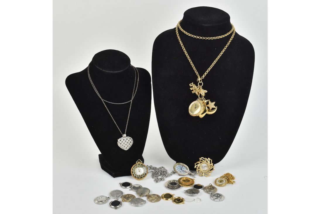 20 Photo Charm Lockets 6 Pendant Watches: (6) Gold tone, (14) silver tone photo charm lockets, (6) Assorted pendant watches, including Lucerne, Gossip, Guess and more. Please Note: Scheerer McCulloch Auctioneer will add shipping charges 1-2 b