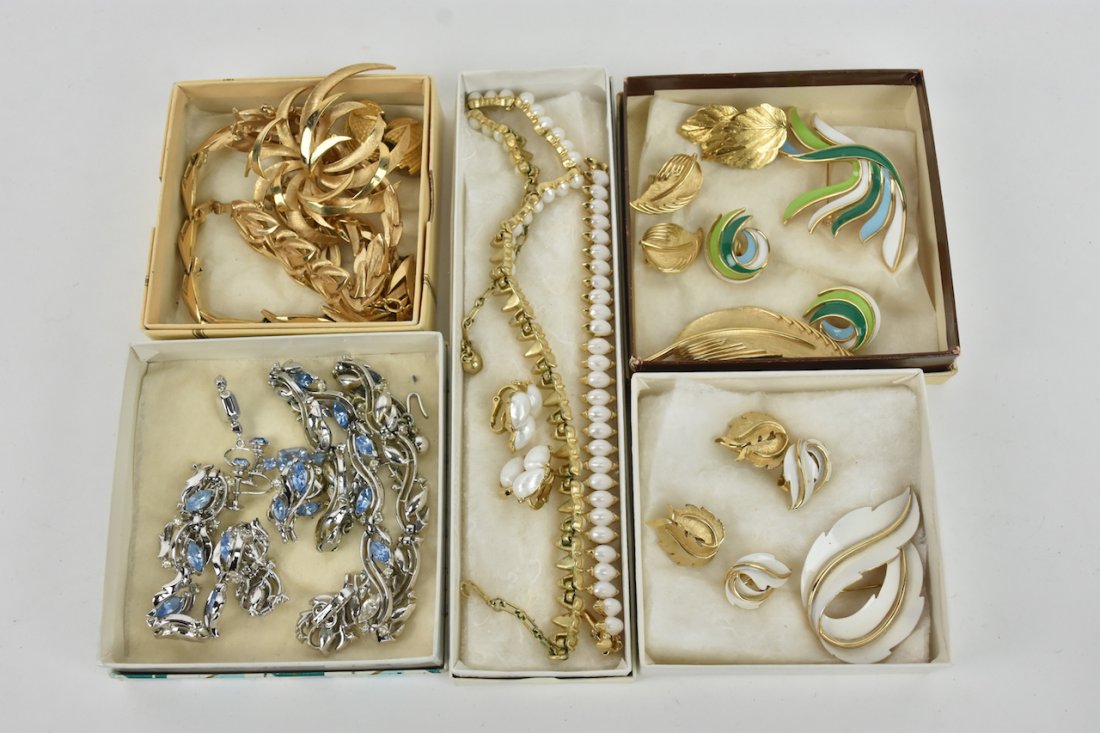 Trifari Costume Jewelry: (19) Pieces Trifari including (3) 4-piece sets, light blue stones, brushed gold flares, white faux pearls, (3) 2-piece sets, (2) sets earrings. All earrings are clips, all pieces are stamped, all item