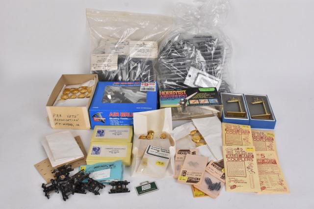 HO Scale Railroad Accessories Incl. Lambert: A collection of train Railroad accessories. Includes Lambert Associates brass water columns; Kato trucks; airbrushes; Kadee couplers; and more. Condition varies- most in original packaging and unused 