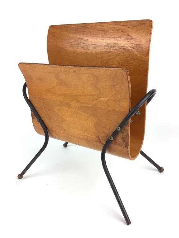 Mid Century wood magazine rack: Mid Century wood magazine rack, not marked. Missing 1 leg ball. Measures 14 1/4"w x 16"h.