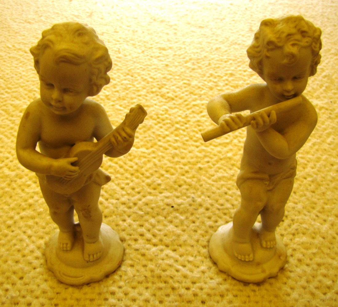 Pair of Orlik Cherub Figurines From Germany: 6" Tall. Marked "1343" on the bottom.