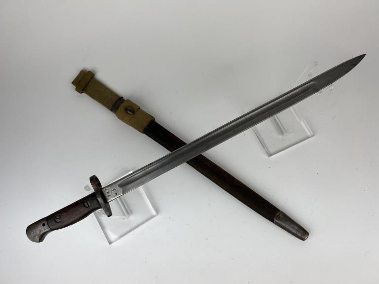 Military-Wilkinson 1907 British Bayonet&Scabbard: Wilkinson British Bayonet with scabbard and woven hanger in tact. Clear identifying markings on ricasso. Also used in WWII Era.