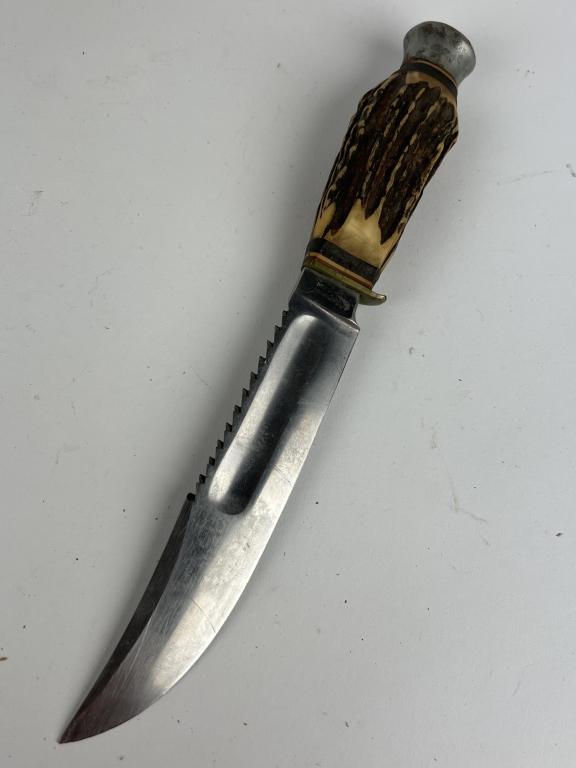 German Hunting Knife Stag Handle-No Sheath: German Hunting Knife with 6 1/2 inch stainless steel blade and Stag grip is 4 inches with metal hardware. "Helmit Hartenau Solingen Germany is stamped on ricasso. Top edge of the blade partly serrated